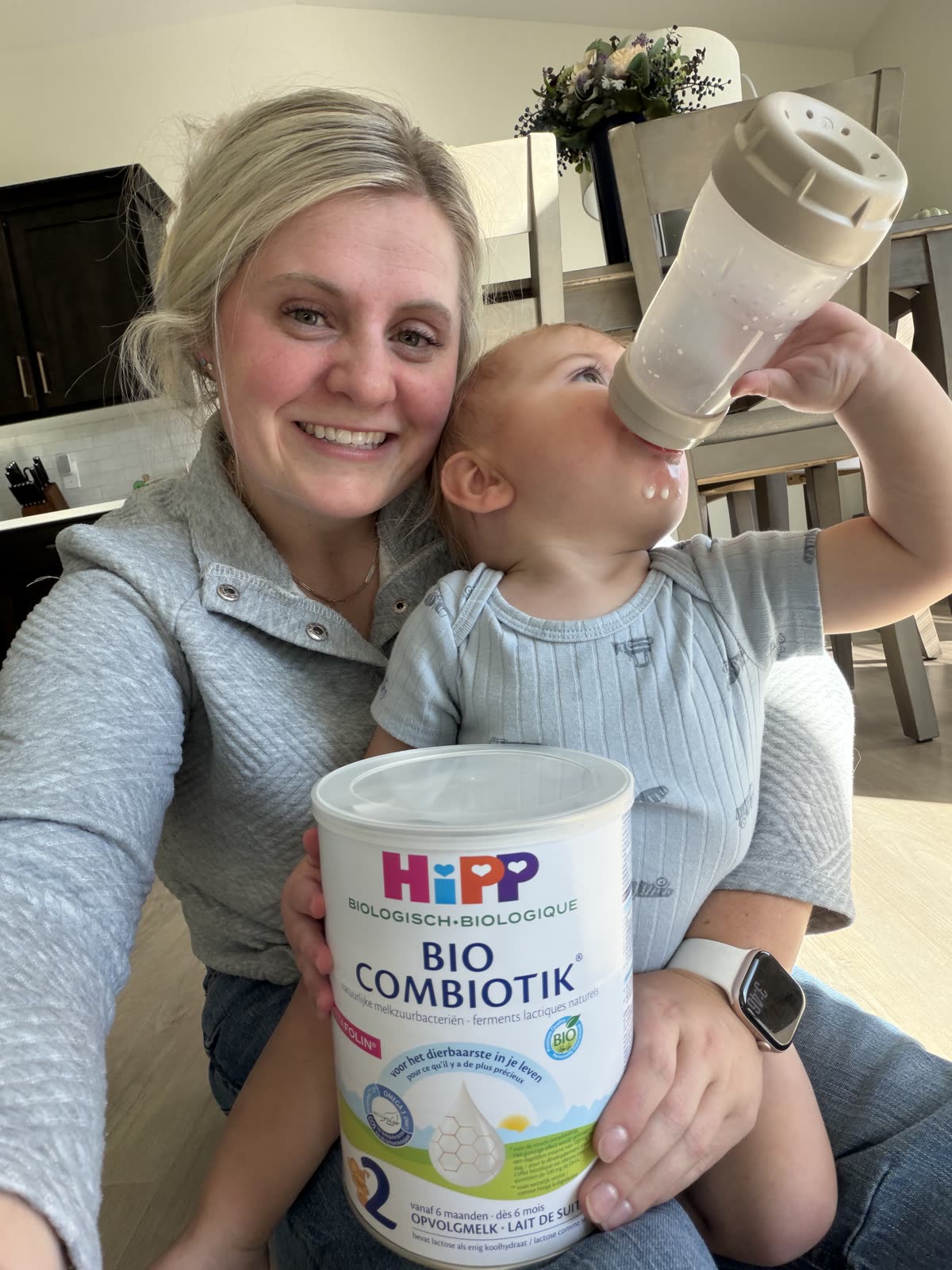 Tatum with her baby and a can of HiPP Dutch